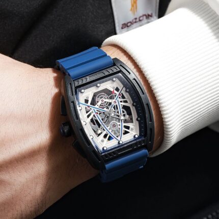 Skeleton-style tonneau fashion watch with blue strap