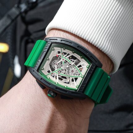 Skeleton-style tonneau fashion watch with green strap
