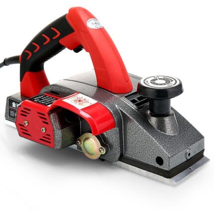 Red hand planer with textured metal housing — front view