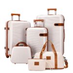 White ribbed luggage collection with matching travel bag and pouch